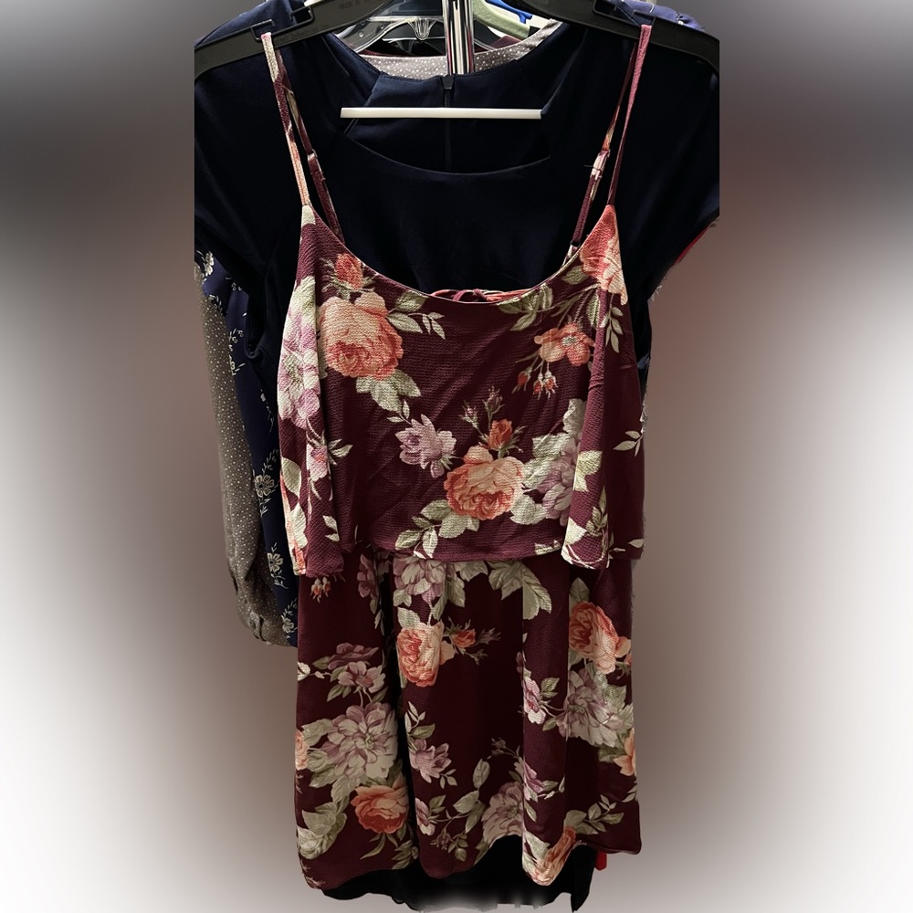 Maroon floral sundress with adjustable straps.